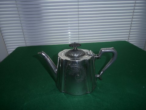 Tin teapot, England approximately 1880.