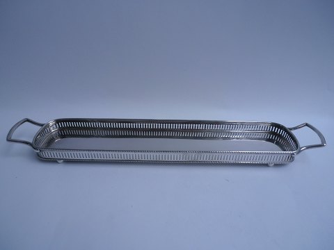 Tray in spot, England approx. 1920.
50cm. long and 8.5cm. wide.