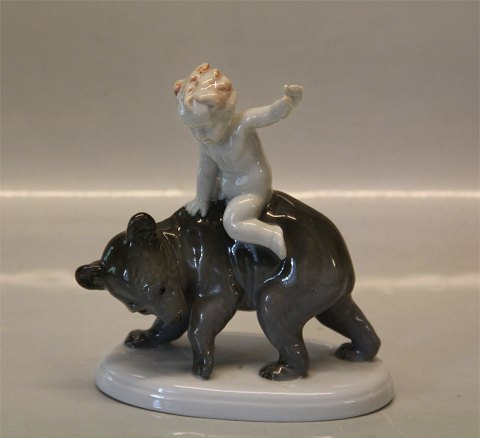 German Metzler Ortloff figure Boy on bear  14 x 13 cm