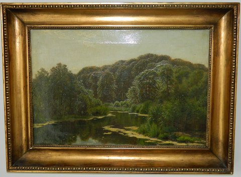 Oil on canvas: Forest scene with lake of Godfred Christensen 19. Century