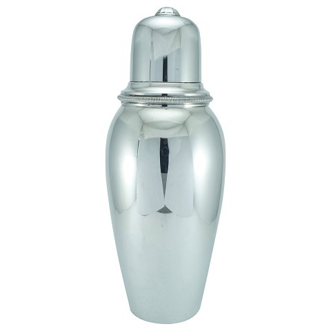 A silverplated cocktail shaker
