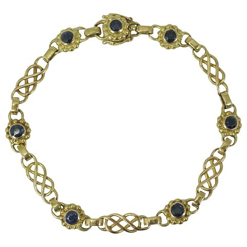 Georg Jensen; Bracelet of 18k gold, set with sapphires #18