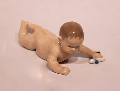 Kgl. porcelænsfigur, liggende baby, nr.: 1739.
Flot stand
