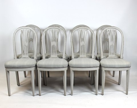 Gustavian furniture set consisting of 8 dining chairs.