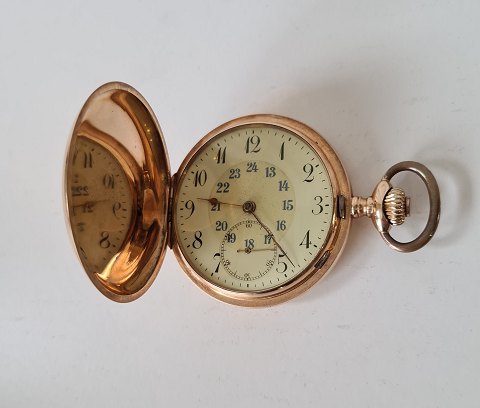 Pocket watch in 14 kt gold.