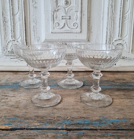 Set of four beautiful French champagne bowls decorated with olive grinds.