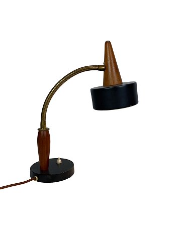 Table lamp of black metal and teak of Danish design from the 1960s. 
5000m2 showroom.
Great condition
