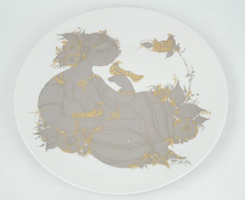 Platte med motiv af dame i guld og grå farver i porcelæn, Bjørn Winnblad
Flot stand
