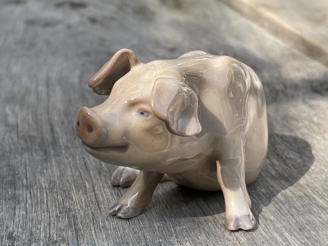 Small porcelain pig by Jens Peter Dahl Jensen (Dahl Jensen) for Bing & Grondahl, 
form no. 1582