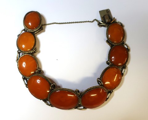 Latvia. Stamped WL. Gold-plated silver bracelet with amber. (875). Several amber 
pieces have small chips.
