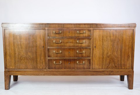 Low Sideboard - Rosewood - Brass Handle - Danish Carpenter - 1950
Great condition

