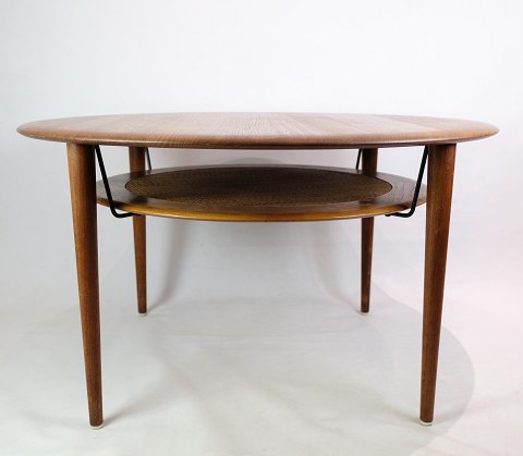 Coffee table - Teak - Wicker newspaper shelf - Peter Hvidt & Orla 
Mølgaard-Nielsen - 1956
Great condition
