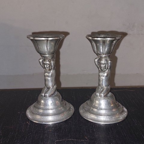 Pair of figurative candlesticks approx. 1920