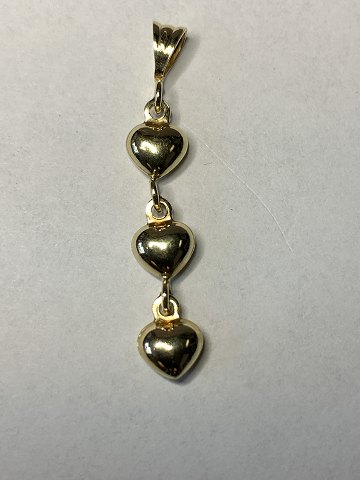Pendant with three gold hearts in 14 carat gold, stamped 585