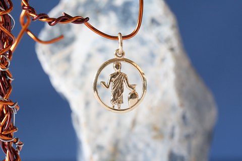 Pendant in 14 carat gold, the star sign Aquarius. Stamped 585