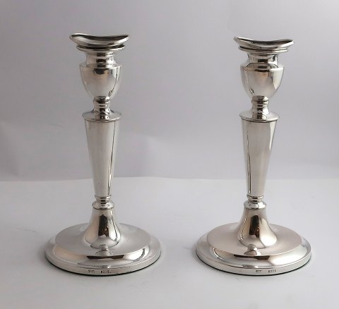 Toxvärd. Silver candlesticks with oval base (830). A pair. Height 19 cm.