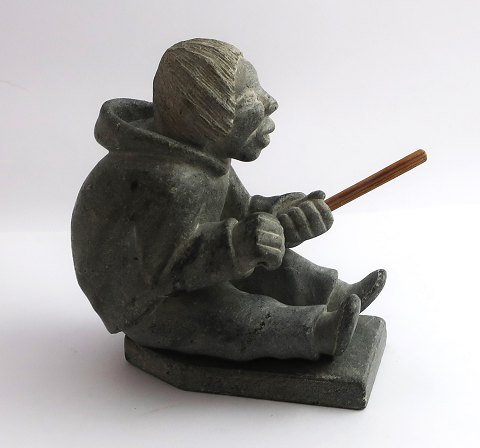 Greenland. Soapstone figure. Seated man. Height 12.5 cm. Something is missing in 
one hand. (Probably KarlK). Provenance Sorgenfri Castle (Prince Knud)