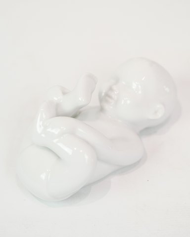 Porcelænsfigur - Pludrende baby - Hvid glasur - Allan Therkelsen
Flot stand
