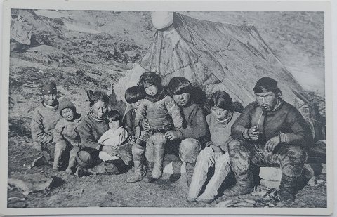 Postcard: Greenlandic family outside tent
