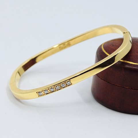 Skriver; Bangle with diamonds in 18k gold