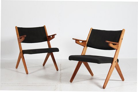 Dansk Møbeldesign
Par lette easy chairs
af massiv eg og teak