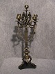 Five armed candelabrum in bronze.