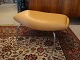 Ox Chair footstool model EJ100 in natural leather.
5000m2 Exhibition.