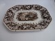 1 brown earthenware tray, England ca. 1880.
