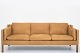Børge Mogensen / Fredericia Stolefabrik
BM 2213 - Reupholstered 3 seater sofa in the Dunes Camel leather with legs in 
teak.
We offer upholstery of the BM 2213 sofa in fabric or leather of your choice. 
Please contact us for more information.
Availability: 6-8 weeks
