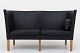 Børge Mogensen / Fredericia Furniture
BM 2214 - Reupholstered 2-seater sofa in black Savanne leather and legs in oak. 
KLASSIK offers upholstery of the sofa in fabric or leather of your choice.
Availability: 6-8 weeks
