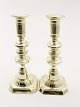 A pair of brass candlesticks