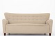 Thorald Madsen / Thorald Madsen
Sofa i original beige Hallingdal uld med ben i bejdset bøg.
1 stk. på lager
Pæn stand
