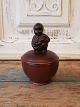 Aluminum small lid bowl with boy with grape bunch on the lid