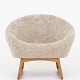 Kurt Østervig / Klassik Studio
Model 57A - Tub chair upholstered in Moonlight color 09 w. sledbase in oiled 
oak.
Availability: 6-8 weeks
Original condition
