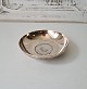 Oriental silver bowl with silver coin