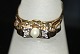 Gold ring with Pearl and Diamonds 14 Carat
Size 63