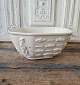 Bode Willumsen for Royal Copenhagen large Blanc de Chine bowl with fish motifs 
in relief no. 4085