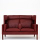 Børge Mogensen / Fredericia Furniture
BM 2192 - Reupholstered sofa in Elegance Indian Red leather and legs in 
mahogany. KLASSIK offers upholstery of the sofa in fabric or leather of your 
choice.
Availability: 6-8 weeks
Renovated
