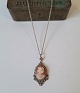 Silver necklace with came set in filigree