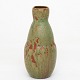 Patrick Nordström / Royal Copenhagen
Large vase in stoneware with green glaze and unglazed areas. Early piece from 
1920. Signed.
1 pc. in stock
Original condition
