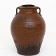 Gutte Eriksen / Eget værksted
Large jar in raku-fired earthenware with brown glaze.
1 pc. in stock
Original condition
