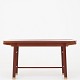 Peter Hvidt & Orla M. Nielsen / Ludvig Pontoppidan
Coffee table in solid Cuban mahogany and shoes in brass with top in black 
glass.
1 pc. in stock
Original condition
