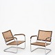 Frits Schlegel / Fritz Hansen
Rare pair of armchairs (model S102) made of metal, original French cane and 
stained beech from the 1930s.
Literature: 
