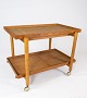 Bar table with extension in oak of danish design manufactured by Hundevad 
Furniture in the 1960s. 
5000m2 showroom.