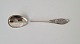 1800s silver jam spoon decorated with cereal