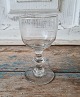 1800s wine glass on stem with button, the basin is painted with very thin white 
enamel decoration in the form of leaf cranes Presumably Mylenberg