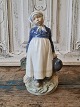 Royal Copenhagen Figure - Peasant girl with lunch no. 815