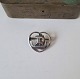 Silver brooch in the shape of a heart with a Viking ship