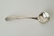 Antique Empire cream spoon in silver