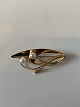 Brooch in 14 carat gold
Stamped 585
Length 5 cm